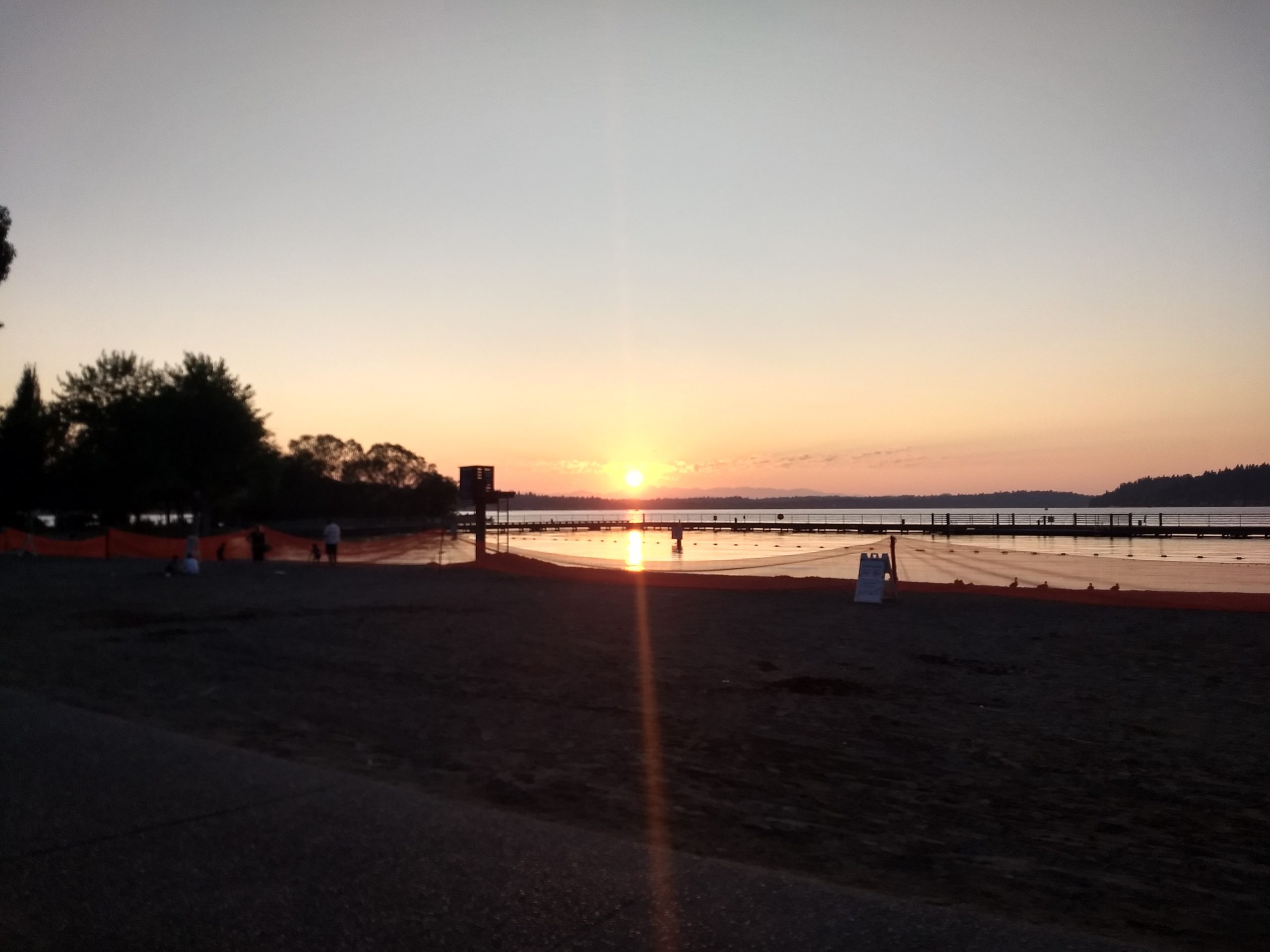 Sunset over Lake Washington at Gene Coulon Memorial Beach Park in Renton.
